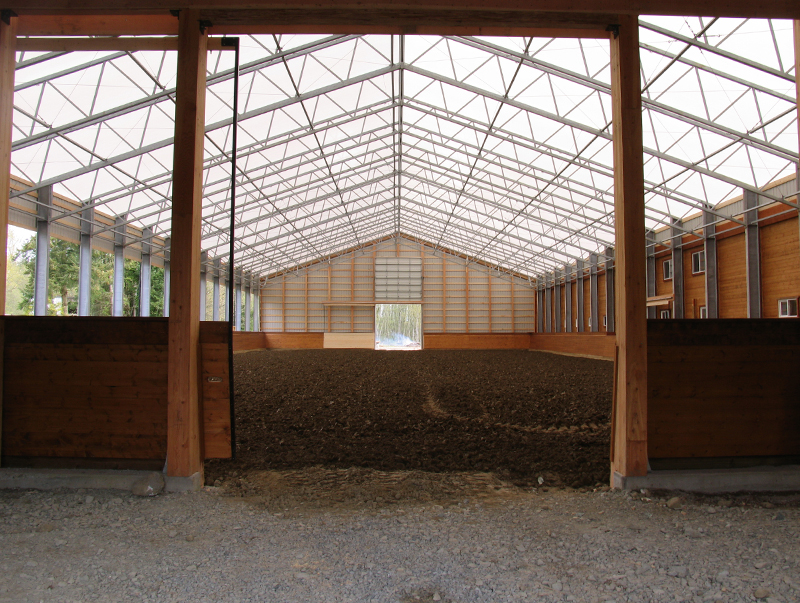 horse riding arena, indoor horse riding arenas, building horse riding arena, we cover, dutchmasters, ironwood building systems, fabric covered horse riding arena, wood post frame horse riding arena, lindsay day remt, steel frame horse riding arena, pre-engineered horse riding arenas, pre-built horse riding arenas, horse arena footing, pdi lasergrade, horse riding arena permit