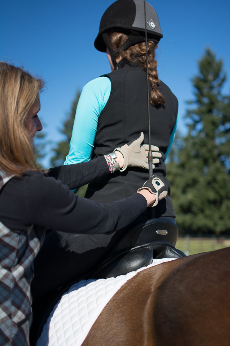 how to improve your horse riding position, horse riding tips, horse riding stretches to improve position in saddle